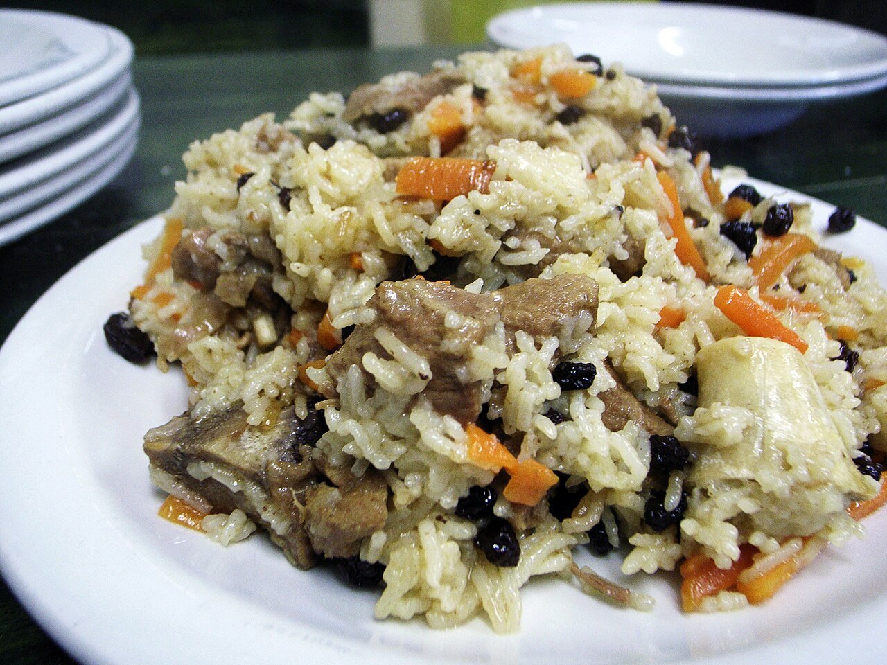 A plate of qabuli palao — fragrant rice with carrots, raisins and lamb, Afghanistan's national dish