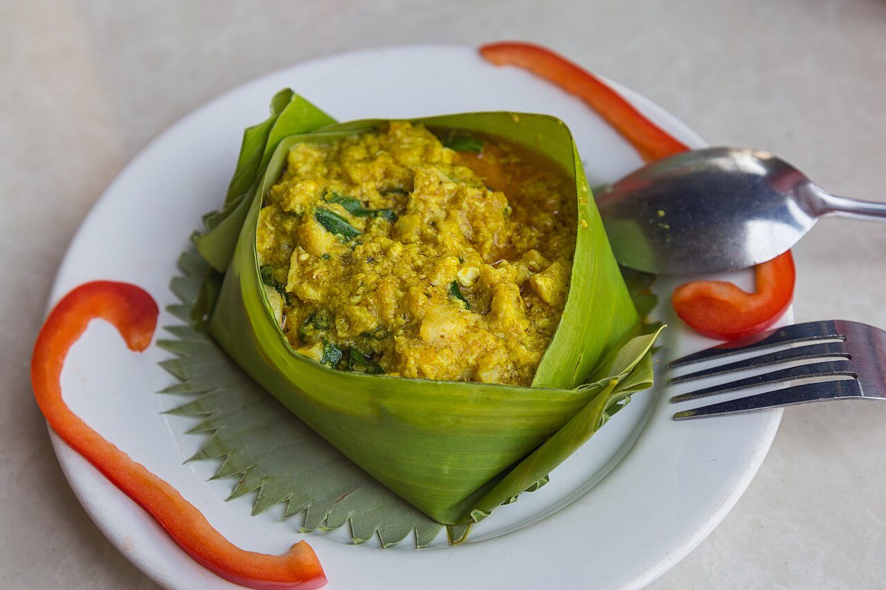 Amok trey — Cambodia's signature fish curry steamed in banana leaf — served at a restaurant in Phnom Penh