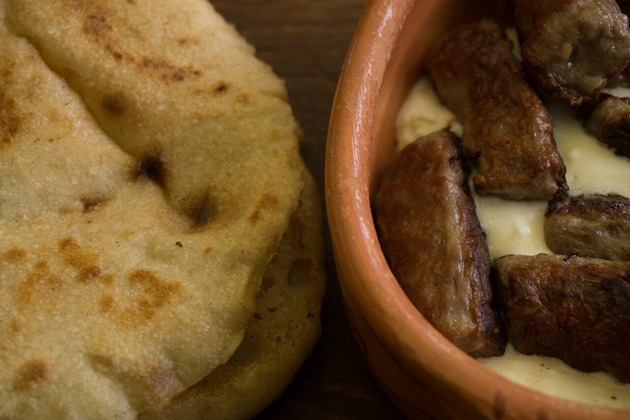 Ćevapi — grilled minced-meat kebabs — served with flatbread (somun) in Zagreb