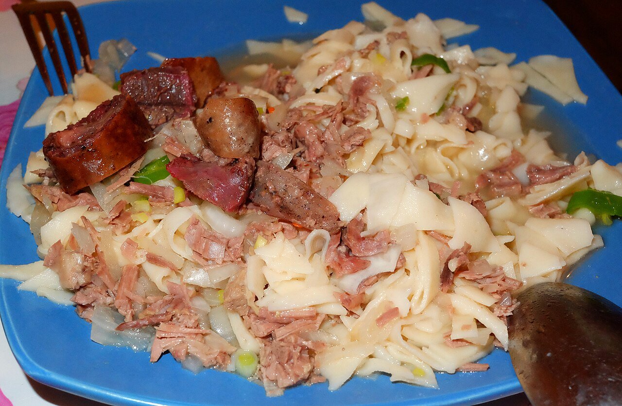 Beshbarmak, Kyrgyzstan's national dish of hand-pulled noodles topped with shredded horse meat, in Bishkek
