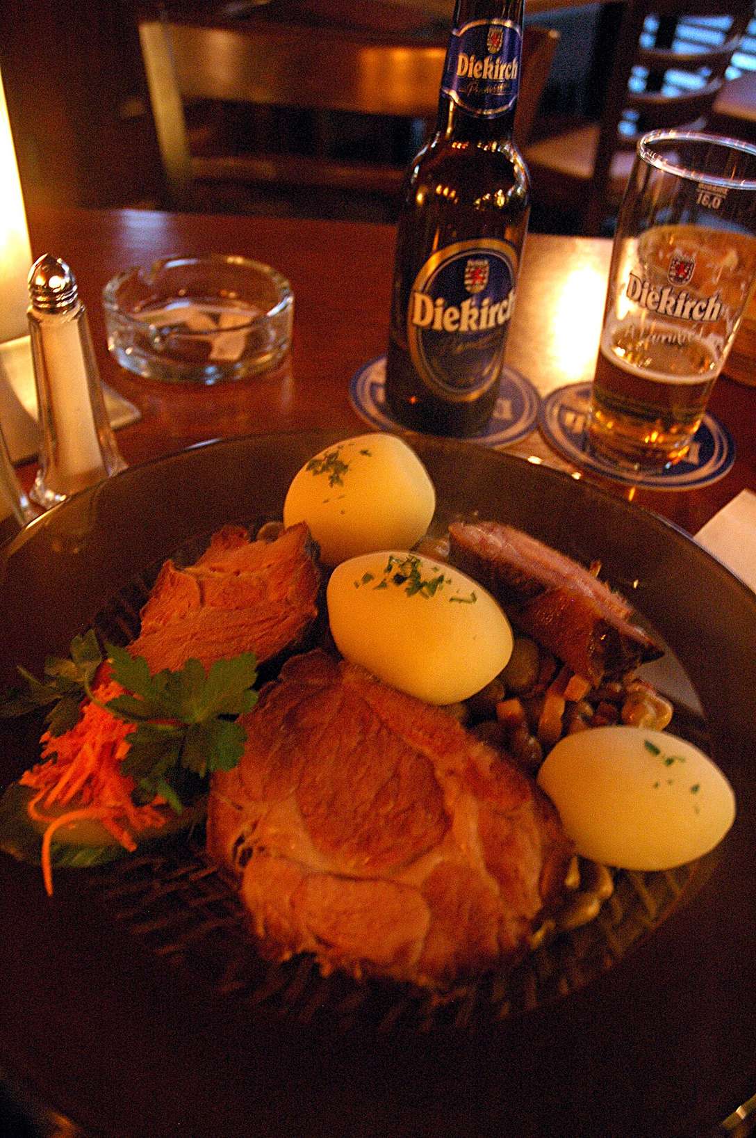 Judd mat Gaardebounen — Luxembourg's national dish of smoked pork collar with broad beans and potatoes — with a Diekirch beer