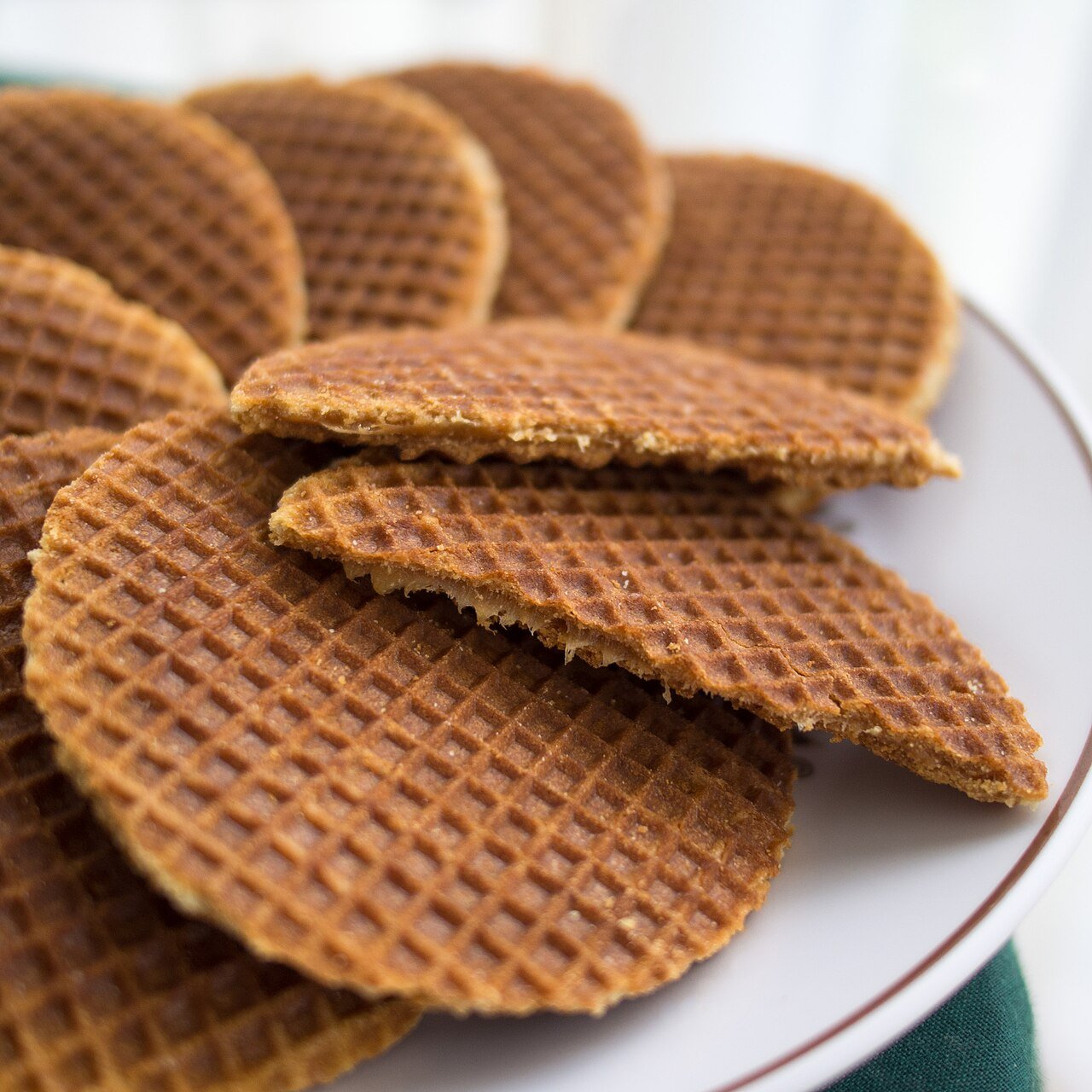 A plate of Dutch stroopwafels — thin caramel-syrup waffle cookies