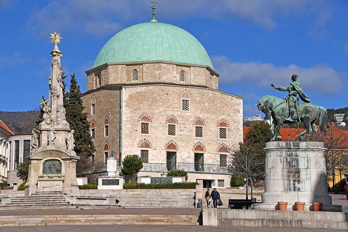 The domed former mosque and monuments on Széchenyi Square in Pécs, Hungary