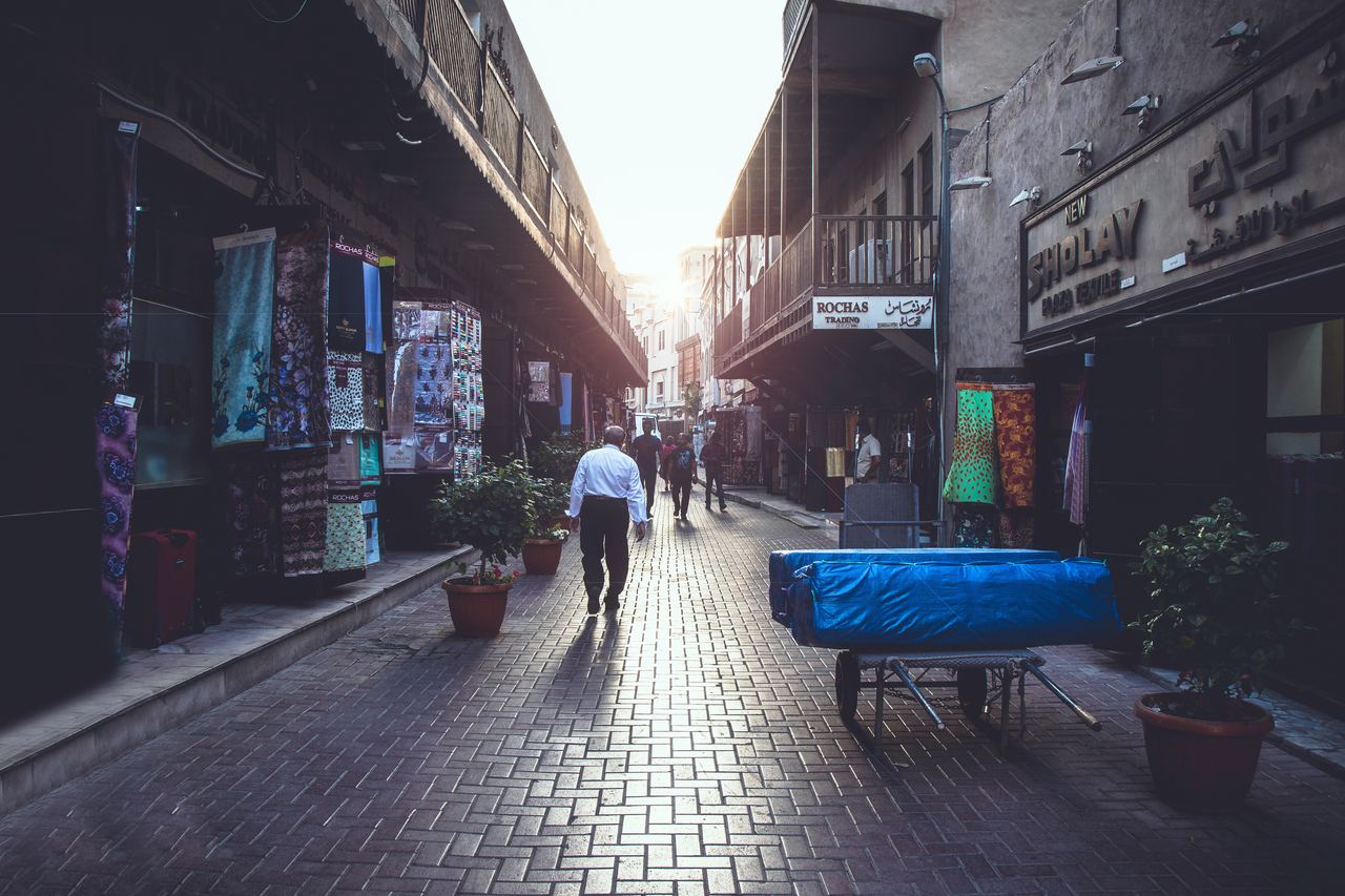 People walk through the souk in Old Dubai, United Arab Emirates