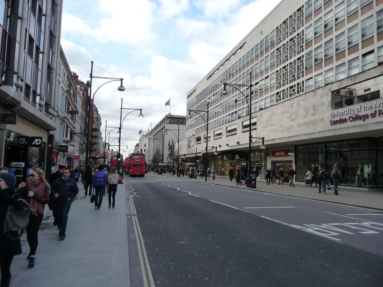 Shoppers and storefronts on Oxford Street in London, United Kingdom