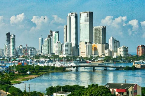 Cartagena’s waterfront skyline rises above the blue bay.